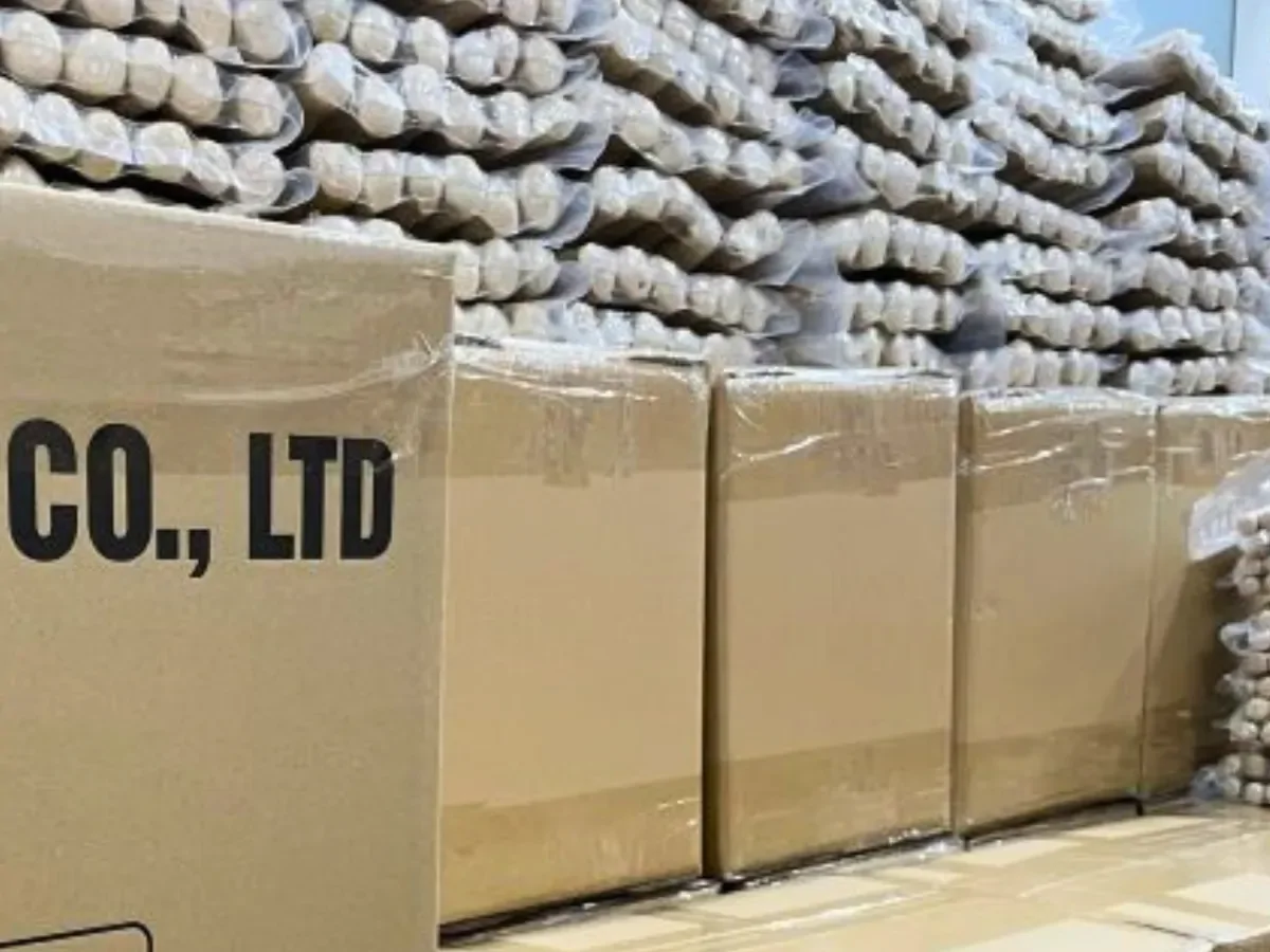 Master cartons of coffee wood dog chews stacked in the WINVN INT warehouse